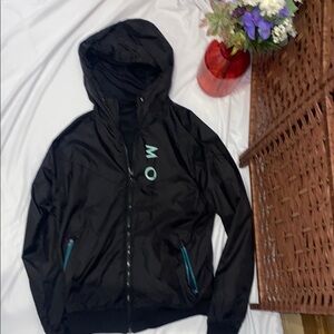 Black Jacket with Blue Zipper Accents left pocket zipper broke